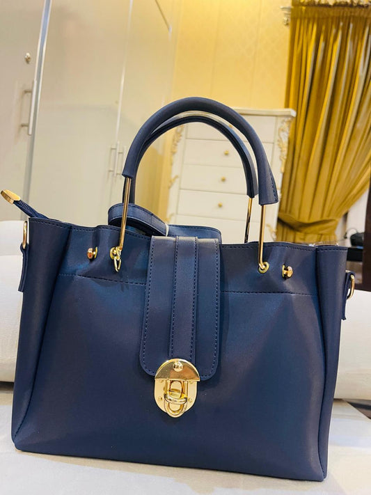 "Luxe Lock 5-in-1 Blue structured tote handbag set from VIBE ELAN, featuring elegant gold hardware, multiple bag sizes, and versatile designs for everyday and formal use."