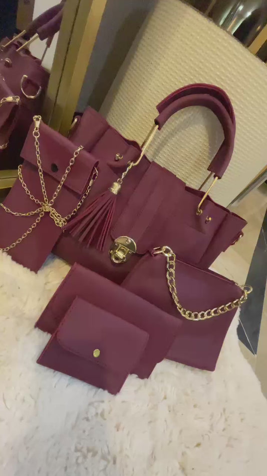 "Luxe Lock 5-in-1 Red structured tote handbag set from VIBE ELAN, featuring elegant gold hardware, multiple bag sizes, and versatile designs for everyday and formal use."